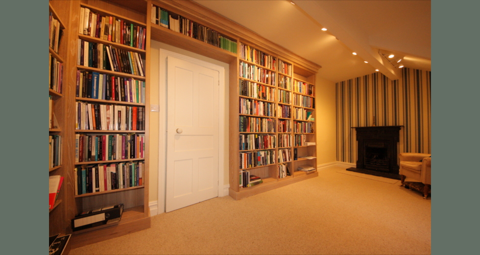 Built-in book shelves in limed oak